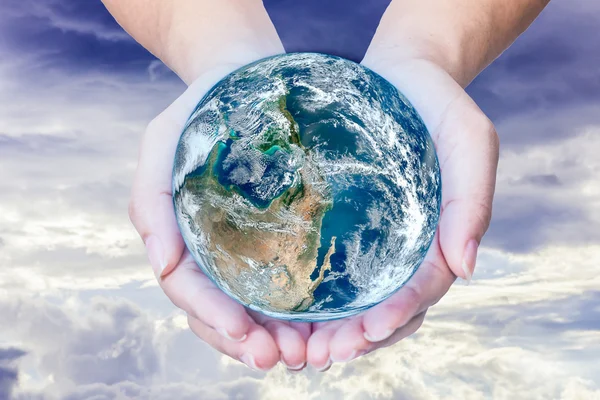 Woman holding globe on her hands,Elements of this image furnishe — Stock Photo, Image