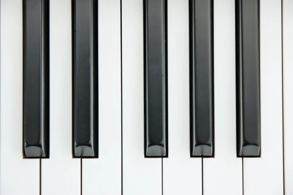 Primer plano del teclado de piano centrado en Ab con un montón de sp blanco — Foto de Stock