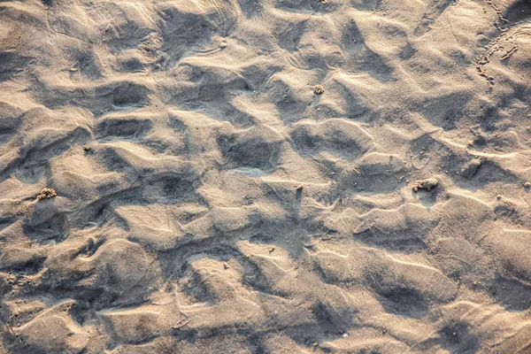 Closeup of sand pattern of a beach in the summer — Stock Photo, Image