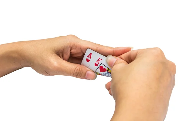 Speelkaarten in de hand geïsoleerd op witte achtergrond — Stockfoto