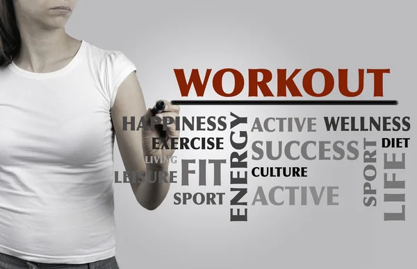 Beautiful woman writing WORKOUT word cloud, fitness, sport, heal — Stock Photo, Image