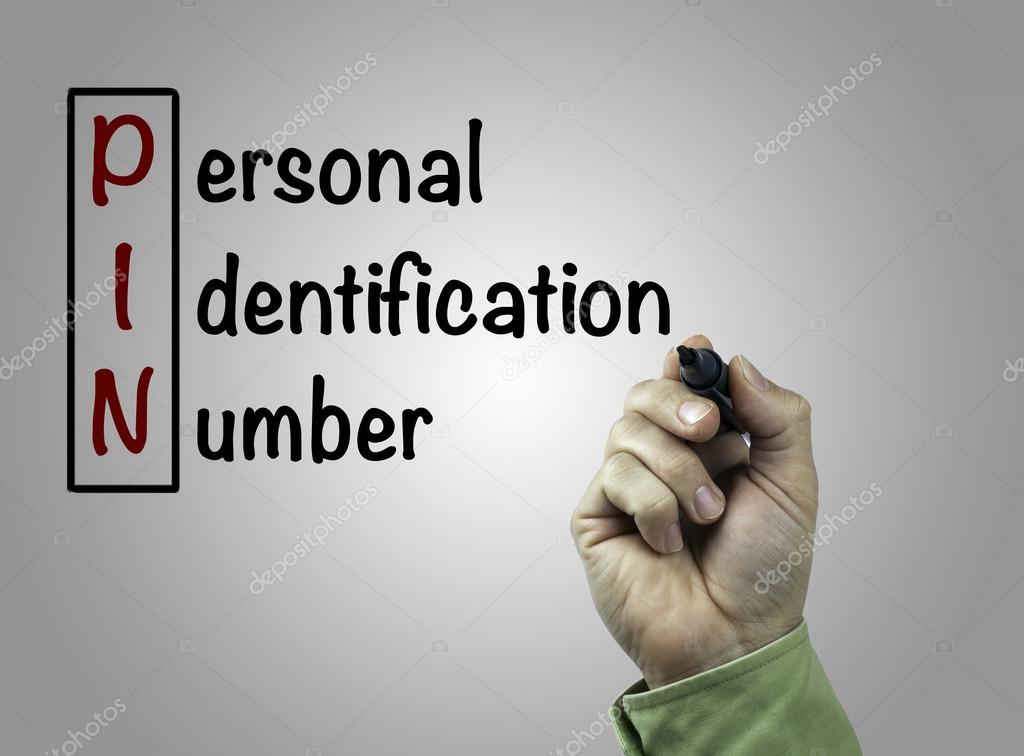 Hand with marker writing Personal Identification Number (PIN) Stock