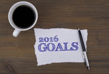 Tablo fincan kahve ile bir parça kağıt ve metin - 2016