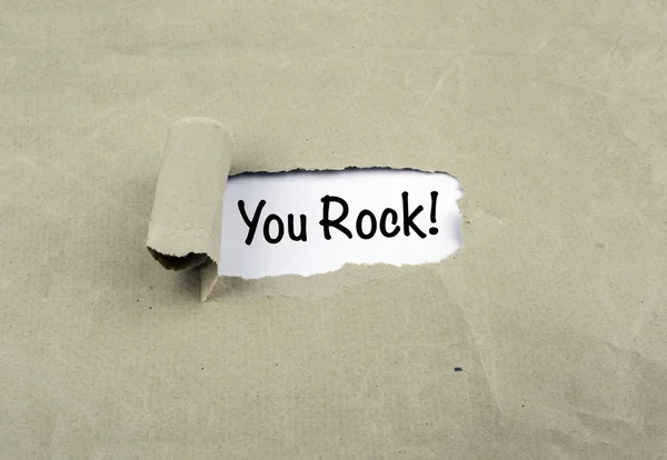 Inscription revealed on old paper - You Rock! — Stock Photo, Image