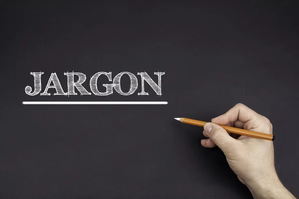 Hand mit weißem Bleistift: Jargon — Stockfoto
