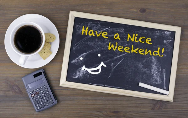 Have a Nice Weekend! Chalk board on a wooden table — Stock Photo, Image