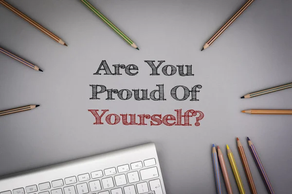 Are You Proud Of Yourself? Colored pencils and a computer keyboa