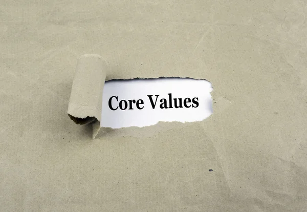 Inscription revealed on old paper - Core Values — Stock Photo, Image