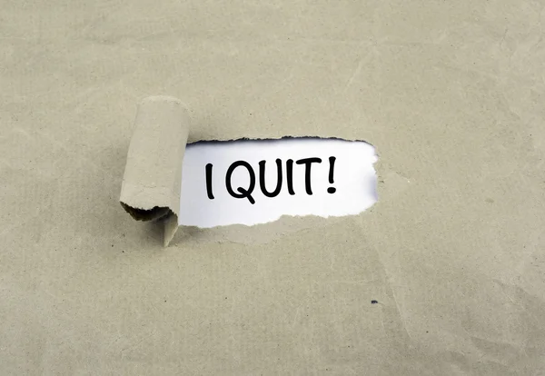 Inscription revealed on old paper - I Quit! — Stock Photo, Image