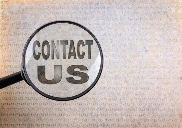 Contact Us. Magnifying optical glass on old paper background