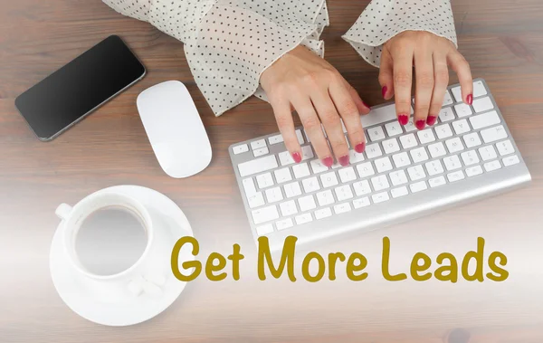 Get More Leads. Business woman working with computer.
