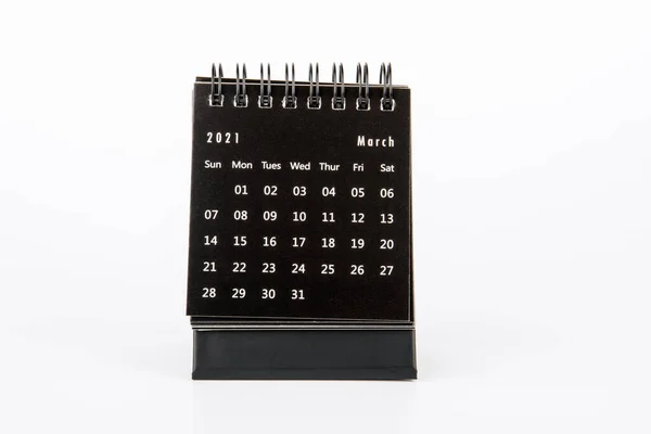 2021 MARCH. Time planning. Paper calendar on a white table — Stock Photo, Image