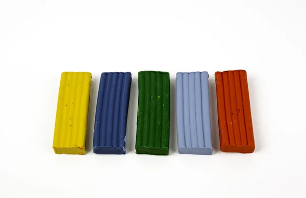 Blocos coloridos de plasticina no branco — Fotografia de Stock
