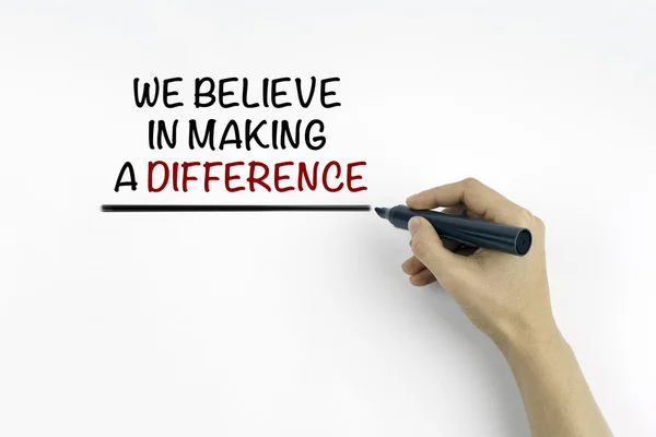 Hand with marker writing the text: We Believe in Making a Differ — Stock Photo, Image