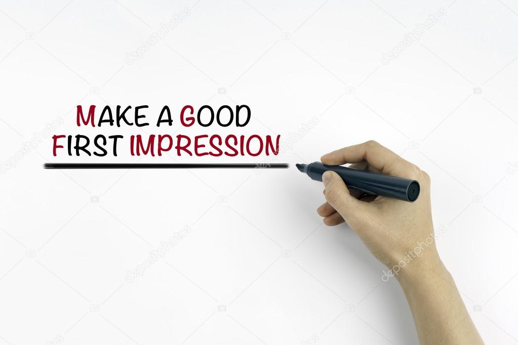 Hand with marker writing: Make a Good First Impression