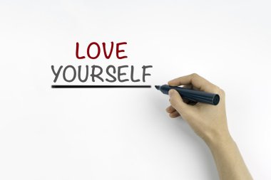 Hand with marker writing: Love Yourself  clipart