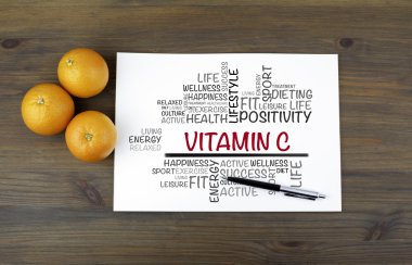 Portakal ve metin ile ahşap arka plan: c vitamini