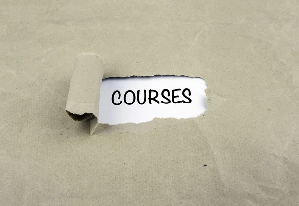 Inscription revealed on old paper - Courses — Stock Photo, Image