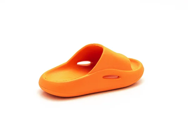 Eine Orangefarbene Kissenrutschsandale Für Kleinkinder Isoliert Auf Weißem Hintergrund Schaumstoff — Stockfoto