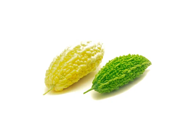 White and green bitter melon gourds isolated on white background. Japanese and Thai Momordica charantia edible fruits