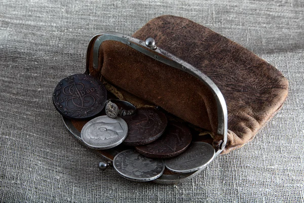 Alte Ledertasche mit Münzen — Stockfoto