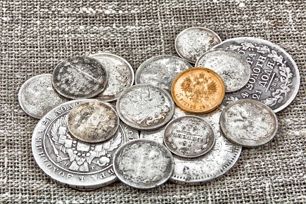 Old coins on sacking — Stock Photo, Image