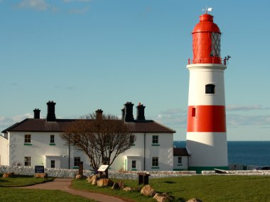 red and white lighthouse in South Shields clipart