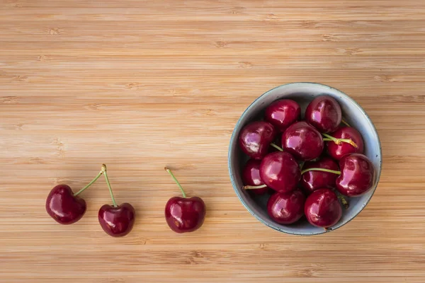 Ripe Dark Red Stella Cherries Porcelain Bowl Bamboo Chopping Board — Stock Photo, Image