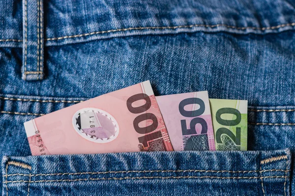 Nieuw-Zeeland bankbiljetten in jeans zak — Stockfoto