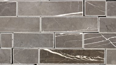 Mermer karşılıklı tuğla yontma yakın çekim dokusuna