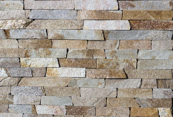 Textura de ladrillos de revestimiento de mármol astillado primer plano — Foto de Stock
