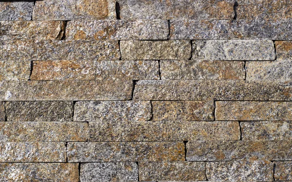 Texture of marble facing bricks chipped close-up — Stock Photo, Image