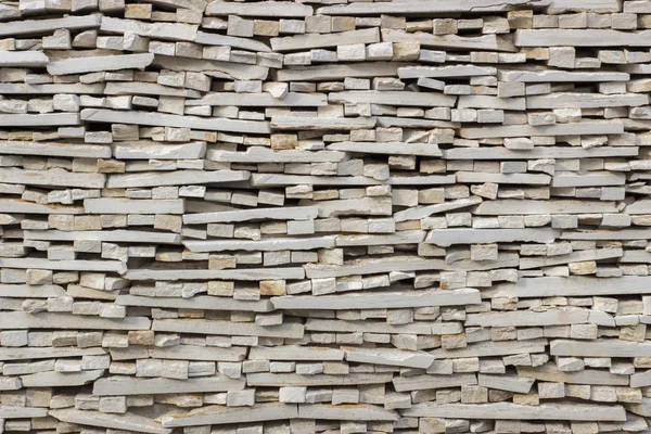 Textura de tijolos de revestimento de mármore lascado close-up — Fotografia de Stock