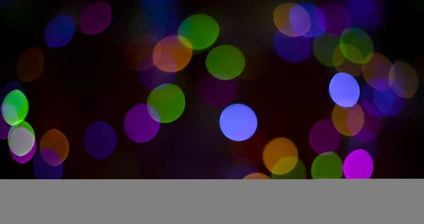 Bokeh Astratto Sfocato Colorato Uno Sfondo Nero — Foto Stock