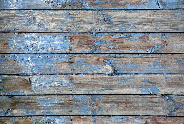 Stará modrá dřevěná textura s oloupanou barvou. — Stock fotografie