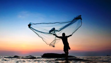 Silhouette of fishermen using nets to catch fish - Fisherman throwing nets clipart