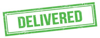 Yeşil grungy vintage dikdörtgen damgalı DELIVERED metin.