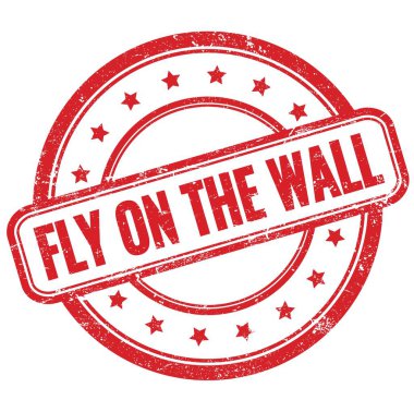 Duvarda Uç kırmızı, eski, pasaklı, yuvarlak, lastik damga üzerine.