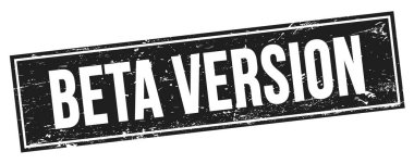 Siyah grungy dikdörtgen damga işareti üzerinde BETA VERSION metin.
