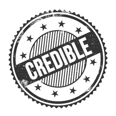Siyah grungy zig zag kenarları üzerine yazılmış CREDIBLE metin yuvarlak pul.