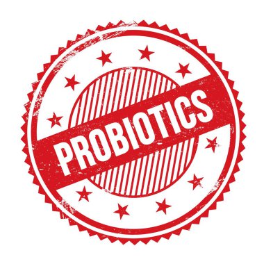 Kırmızı grungy zig zag kenarlarında yazılmış PROBIOTICS metni yuvarlak pul.