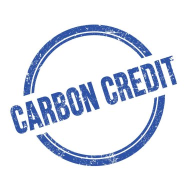 Mavi grungy vintage yuvarlak pul üzerine yazılmış CARBON CREDIT metni.