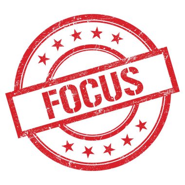 Kırmızı yuvarlak plastik damga üzerine yazılmış FOCUS metni.