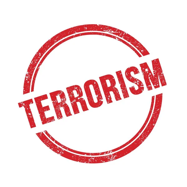 Kırmızı grungy vintage yuvarlak damga üzerine yazılmış TERRORISM metni.