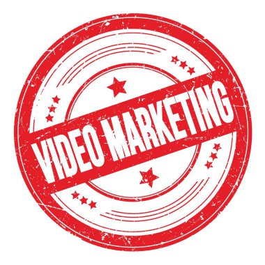 Kırmızı yuvarlak grungy desen damgalı VIDEO MARKETING metin.