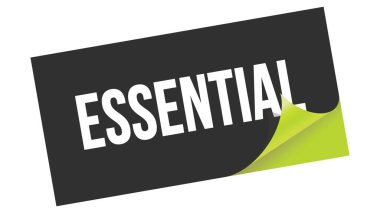 Siyah yeşil etiket damgası üzerine yazılmış ESSENTIAL metin.