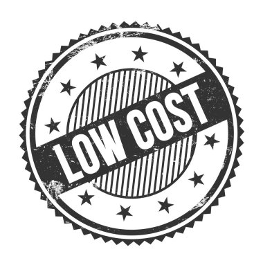 Düşük Maliyetli metin siyah grungy zig zag kenarları yuvarlak pul üzerine yazılmış.