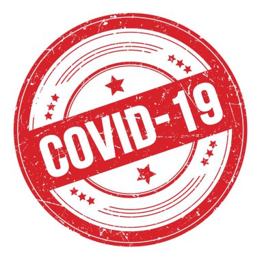 Kırmızı yuvarlak grungy desen damgası üzerine COVID-19 metin.