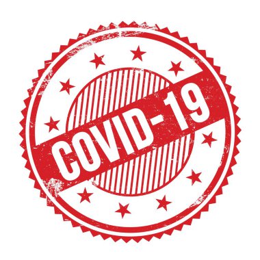 Kırmızı grungy zig zag kenarlarında yazılmış COVID-19 metni pul yuvarlak.