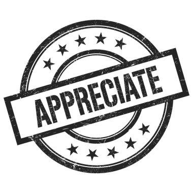 Siyah yuvarlak vintage kauçuk damga üzerine yazılmış metni değerlendir.